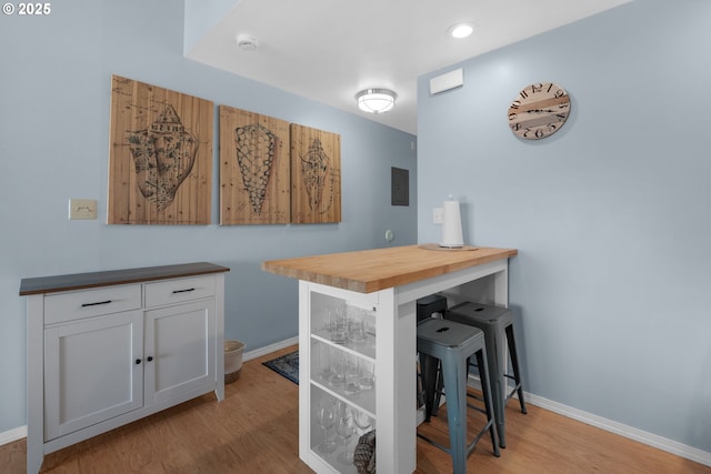 2316 Beach Dr Unit 157, Seaside, OR 97138 - bar with wood finished floors, baseboards, and recessed lighting