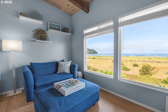 2316 Beach Dr Unit 157, Seaside, OR 97138 - sitting room featuring wood finished floors, a water view, wooden ceiling, and baseboards