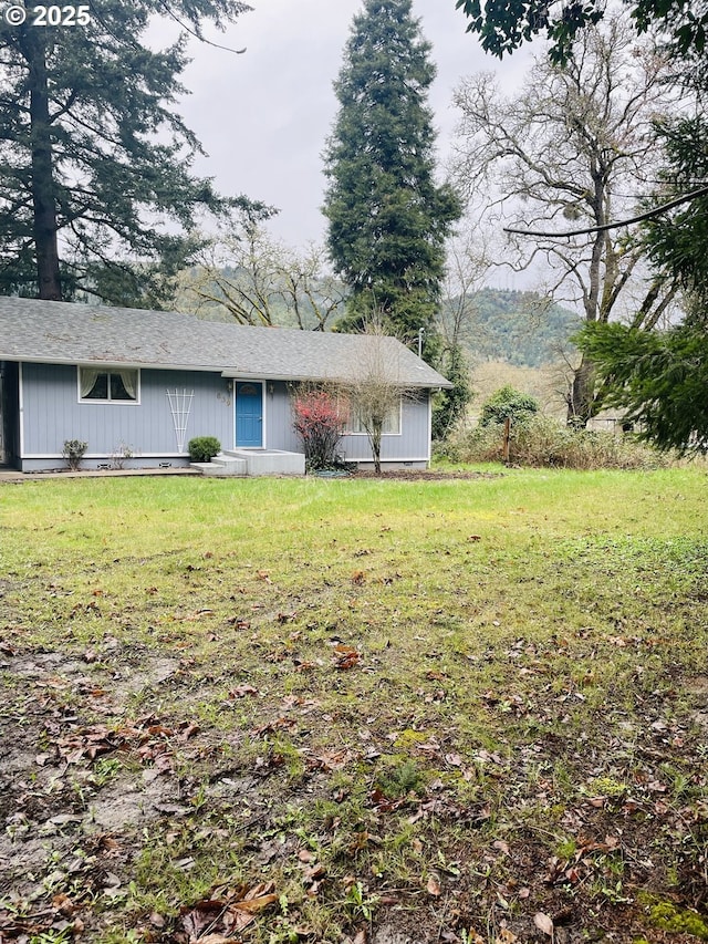 view of front of house with a front lawn