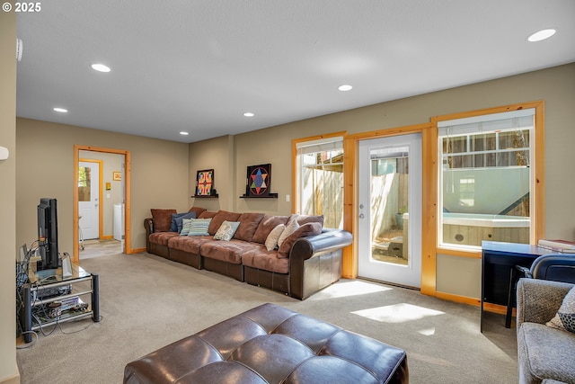 living area featuring recessed lighting, carpet, and baseboards
