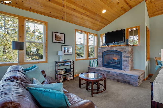 living room featuring wood ceiling, a stone fireplace, baseboards, lofted ceiling, and carpet
