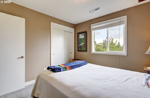 688 53rd St, Washougal, WA 98671 - carpeted bedroom featuring a closet and baseboards