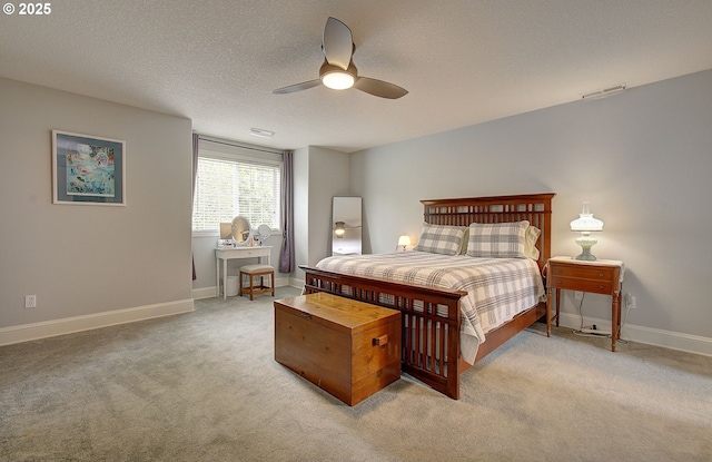 688 53rd St, Washougal, WA 98671 - bedroom with light colored carpet, a ceiling fan, a textured ceiling, and baseboards