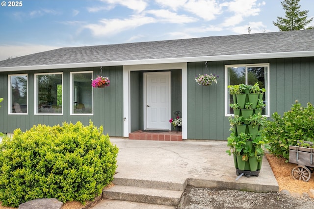 718 Rhoades Rd, Winlock, WA 98596 - view of exterior entry featuring roof with shingles