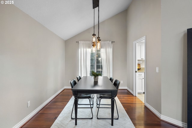 15421 SW Thurston Ln, Portland, OR 97224 - dining room featuring dark wood-style floors, baseboards, and high vaulted ceiling