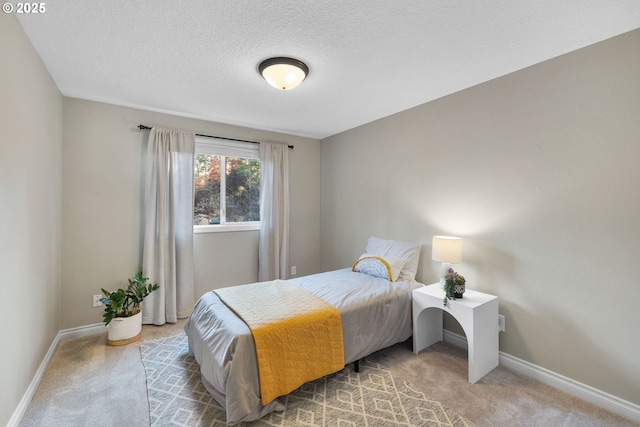 15421 SW Thurston Ln, Portland, OR 97224 - bedroom with carpet flooring, baseboards, and a textured ceiling