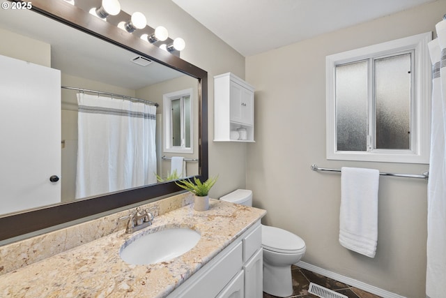 15421 SW Thurston Ln, Portland, OR 97224 - full bath featuring vanity, toilet, baseboards, tile patterned flooring, and a shower with curtain