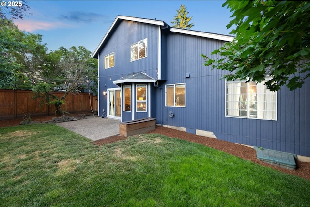 15421 SW Thurston Ln, Portland, OR 97224 - rear view of property featuring a patio area