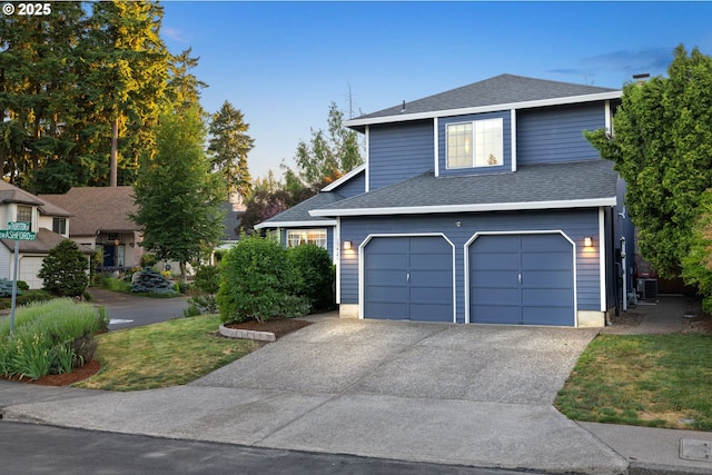 15421 SW Thurston Ln, Portland, OR 97224 - view of front of property with a garage, roof with shingles, driveway, and cooling unit