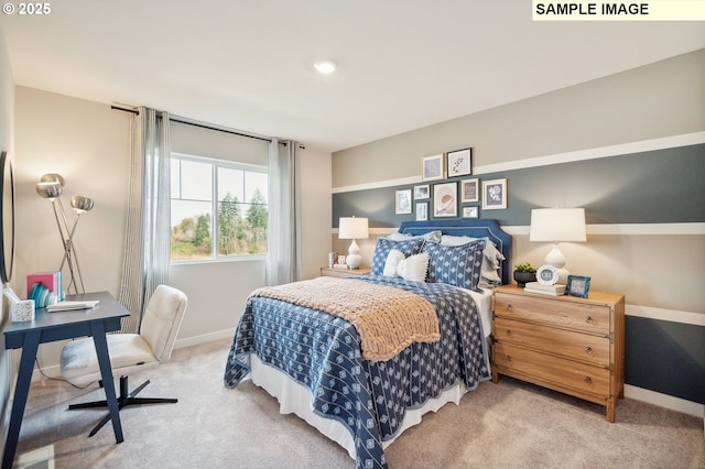 bedroom featuring carpet flooring, baseboards, and a desk