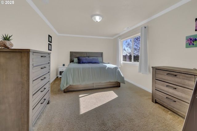 bedroom with carpet flooring, crown molding, visible vents, and baseboards