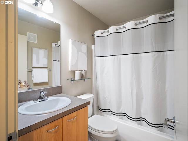 bathroom with shower / tub combo, visible vents, vanity, and toilet