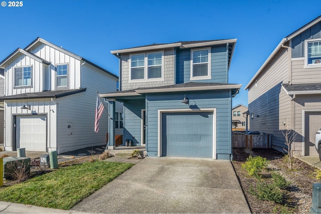 view of front of house featuring a garage, board and batten siding, and concrete driveway