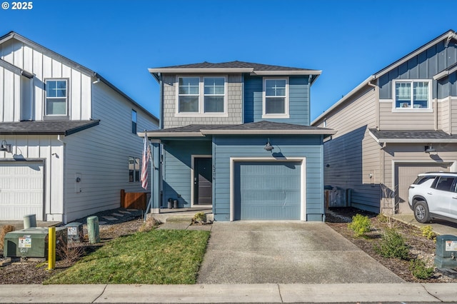 view of front of property with a garage and driveway