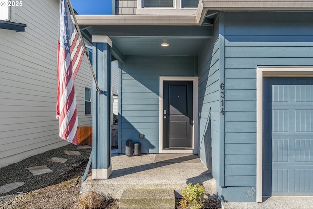 entrance to property with a garage