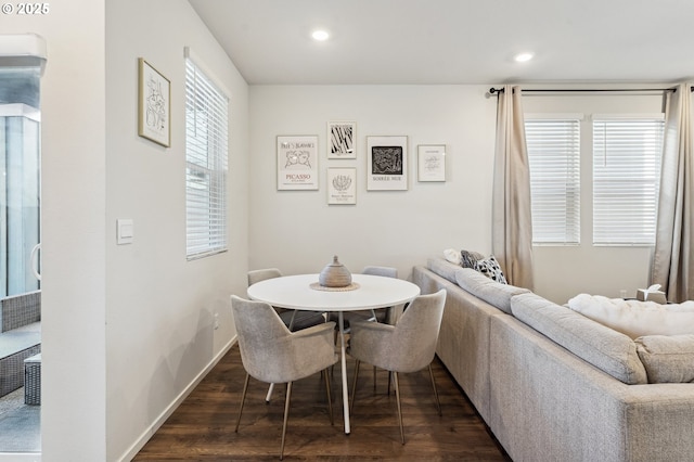 dining area with dark wood-style flooring, recessed lighting, and baseboards