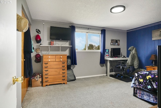 carpeted bedroom featuring a textured ceiling