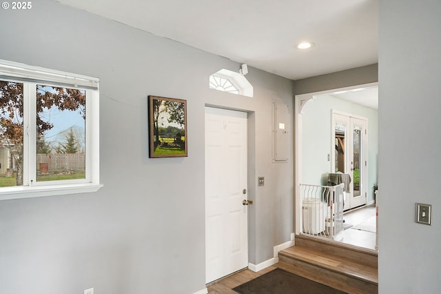 entrance foyer featuring recessed lighting, baseboards, and wood finished floors