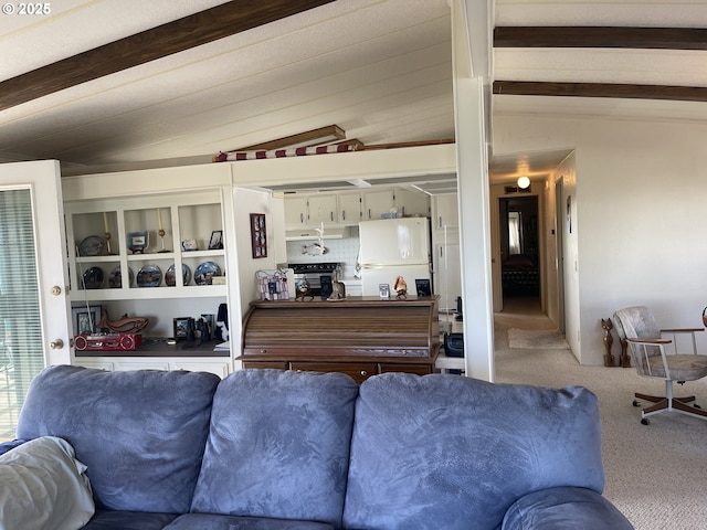 carpeted living room featuring vaulted ceiling with beams