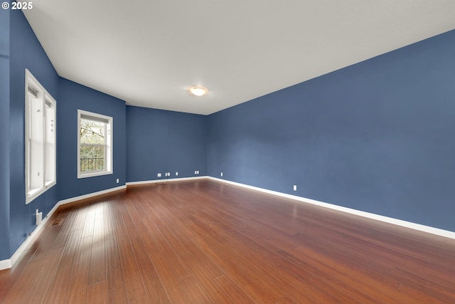 6018 Fernhill Loop, Springfield, OR 97478 - empty room featuring baseboards and wood finished floors
