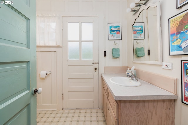 bathroom with vanity and tile patterned floors
