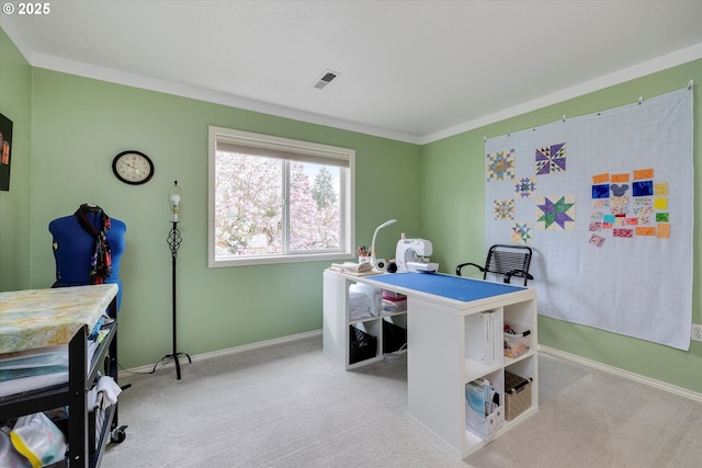 carpeted office featuring baseboards, visible vents, and crown molding