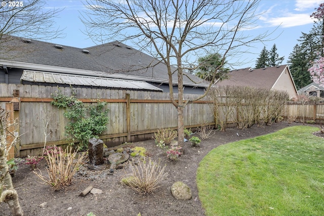 view of yard featuring fence