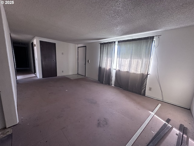 interior space with a textured ceiling