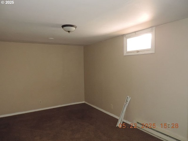911 F St, The Dalles, OR 97058 - spare room featuring baseboards and dark carpet