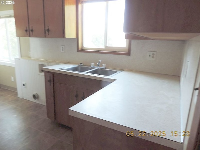 911 F St, The Dalles, OR 97058 - kitchen featuring healthy amount of natural light and light countertops