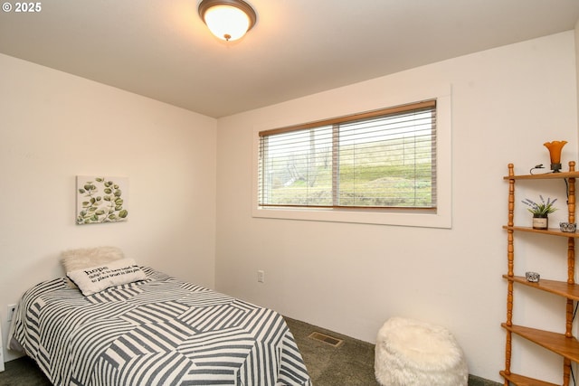 carpeted bedroom with visible vents