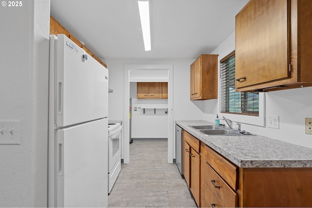 kitchen with sink and white appliances