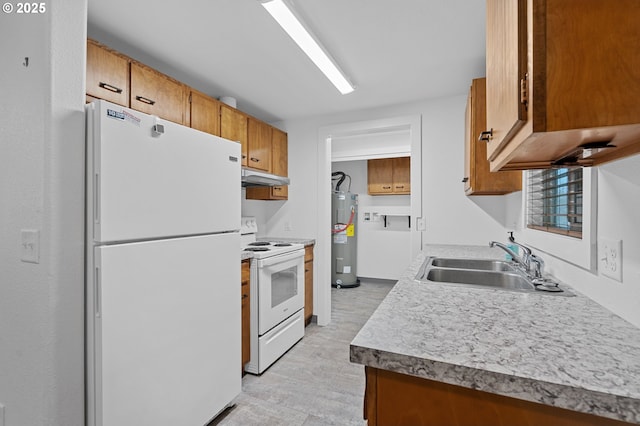 kitchen with water heater, sink, and white appliances