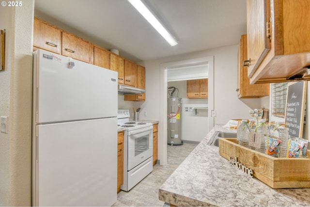 kitchen featuring white appliances, light countertops, under cabinet range hood, and water heater