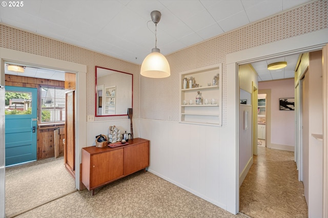 7814 N Wall Ave, Portland, OR 97203 - hall featuring a wainscoted wall and baseboards