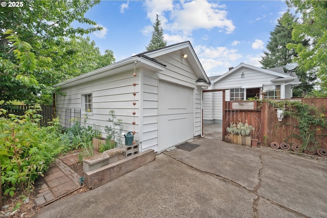7814 N Wall Ave, Portland, OR 97203 - detached garage featuring driveway