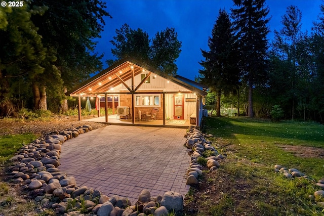 37459 Boulder Flat Ln, Halfway, OR 97834 - view of front of property featuring a patio area and a lawn