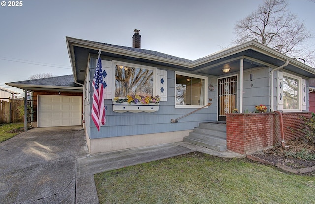 view of front of home with a garage