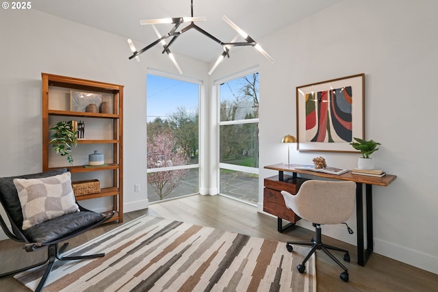 office area featuring wood finished floors and baseboards