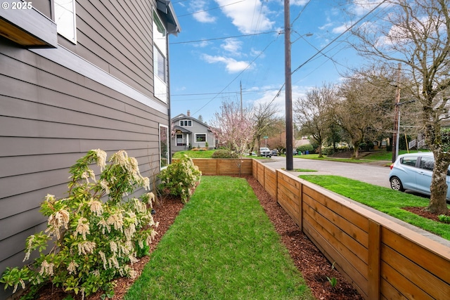 view of yard featuring fence