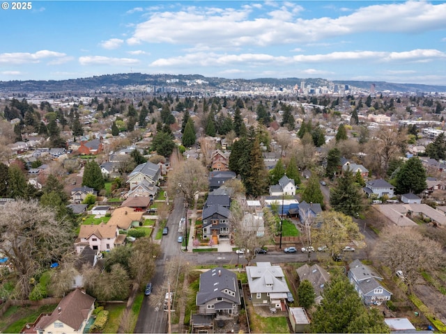 bird's eye view featuring a mountain view and a residential view