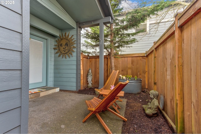 view of patio with fence