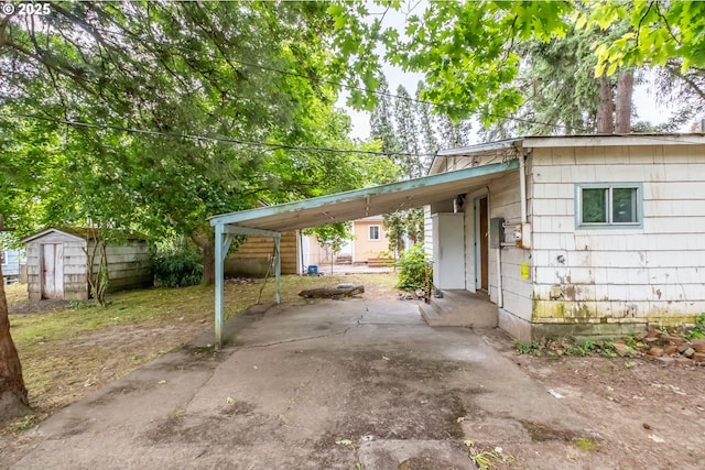 274 Senate St NW, Salem, OR 97304 - view of car parking with a storage shed and a carport