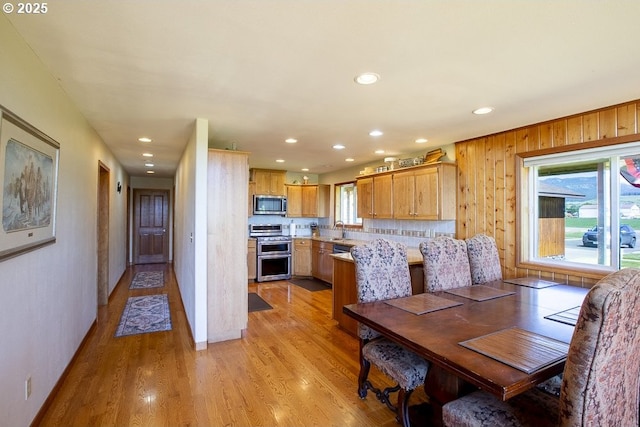 62123 Chandler Loop, La Grande, OR 97850 - dining room with plenty of natural light, recessed lighting, light wood-style flooring, and baseboards