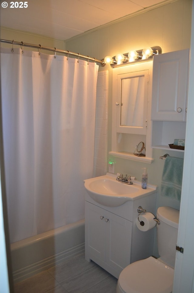 full bathroom with toilet, shower / bath combo with shower curtain, and vanity