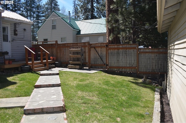 view of yard with a gate