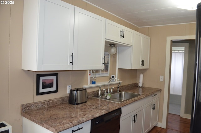 kitchen featuring a sink, black dishwasher, white cabinets, crown molding, and wood finished floors