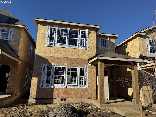 view of front of property featuring a front yard