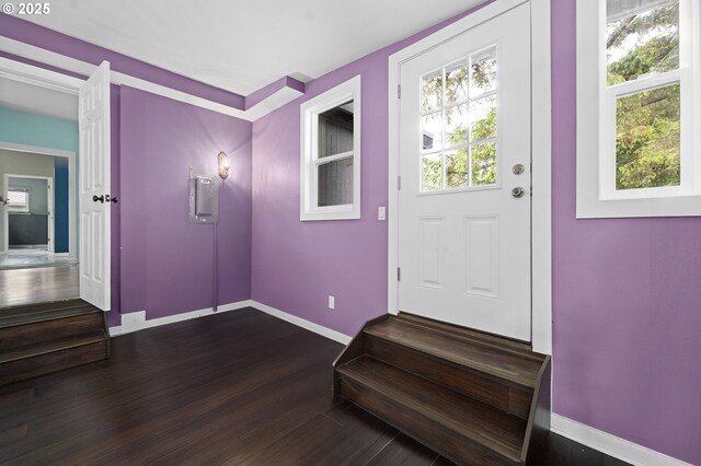 404 Chinook Ave, Astoria, OR 97103 - entryway with baseboards, dark wood-style floors, and stairway