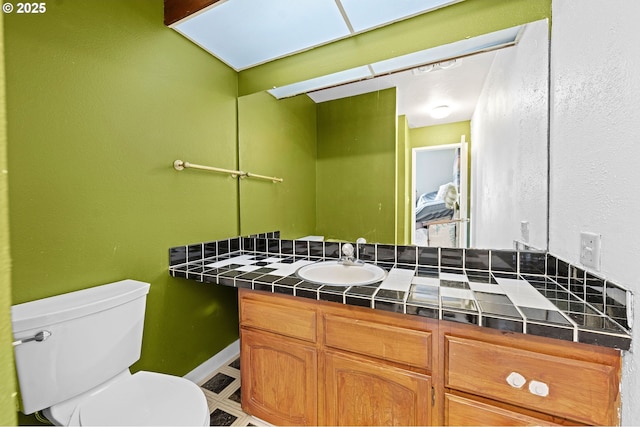 404 Chinook Ave, Astoria, OR 97103 - half bathroom with vanity and toilet